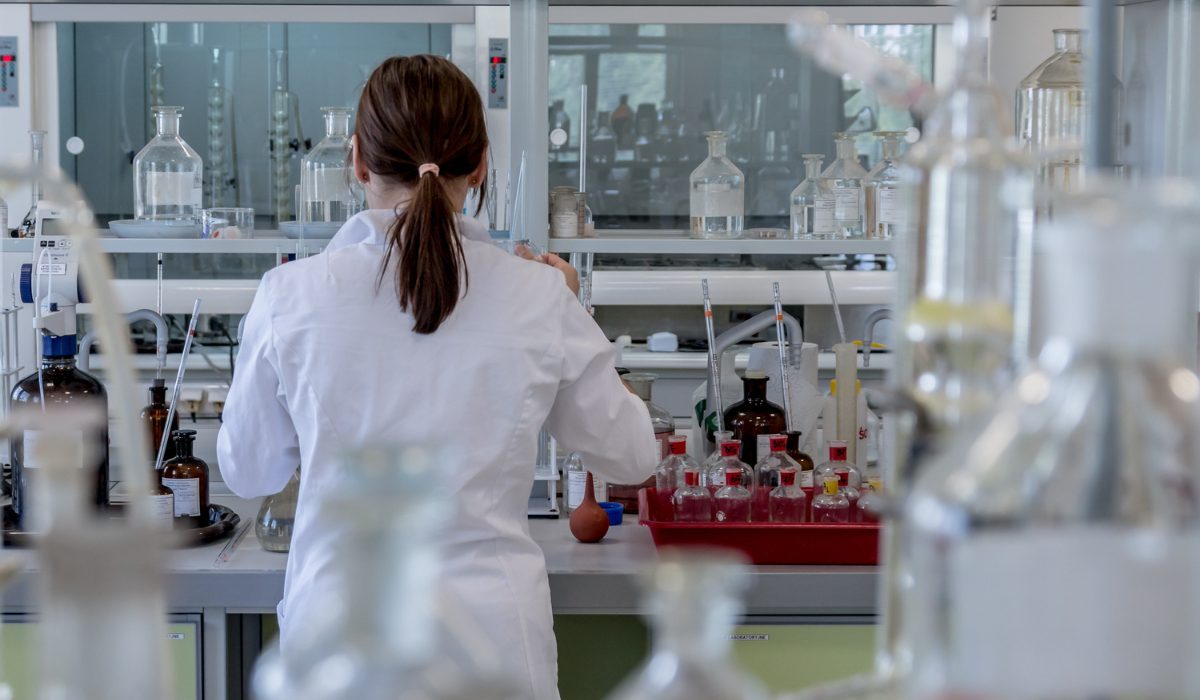 Laboratory technician working at a blood testing bench