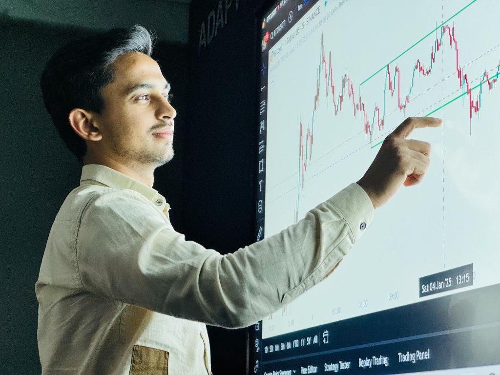 Reviewing a trend chart on a large wall display